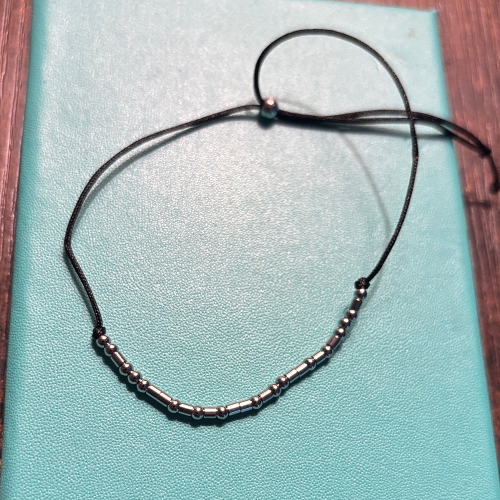 Silver Beaded Bracelet on Black Cord